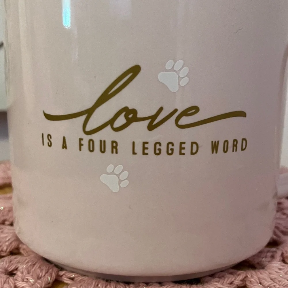 Pretty Pink Mug reads “love is a four legged word”!